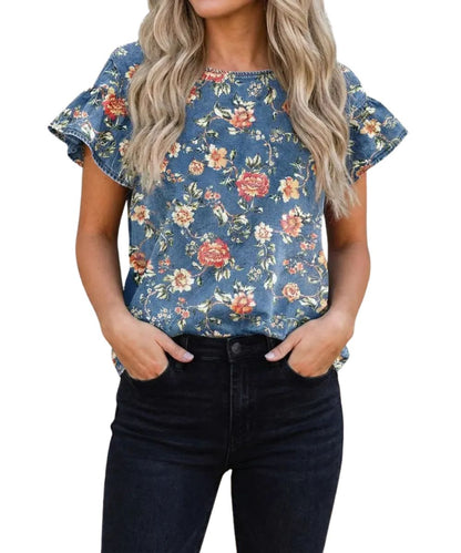 Front view of the women's ashleigh blue denim blouse featuring a floral print, round neckline, and short ruffle sleeves