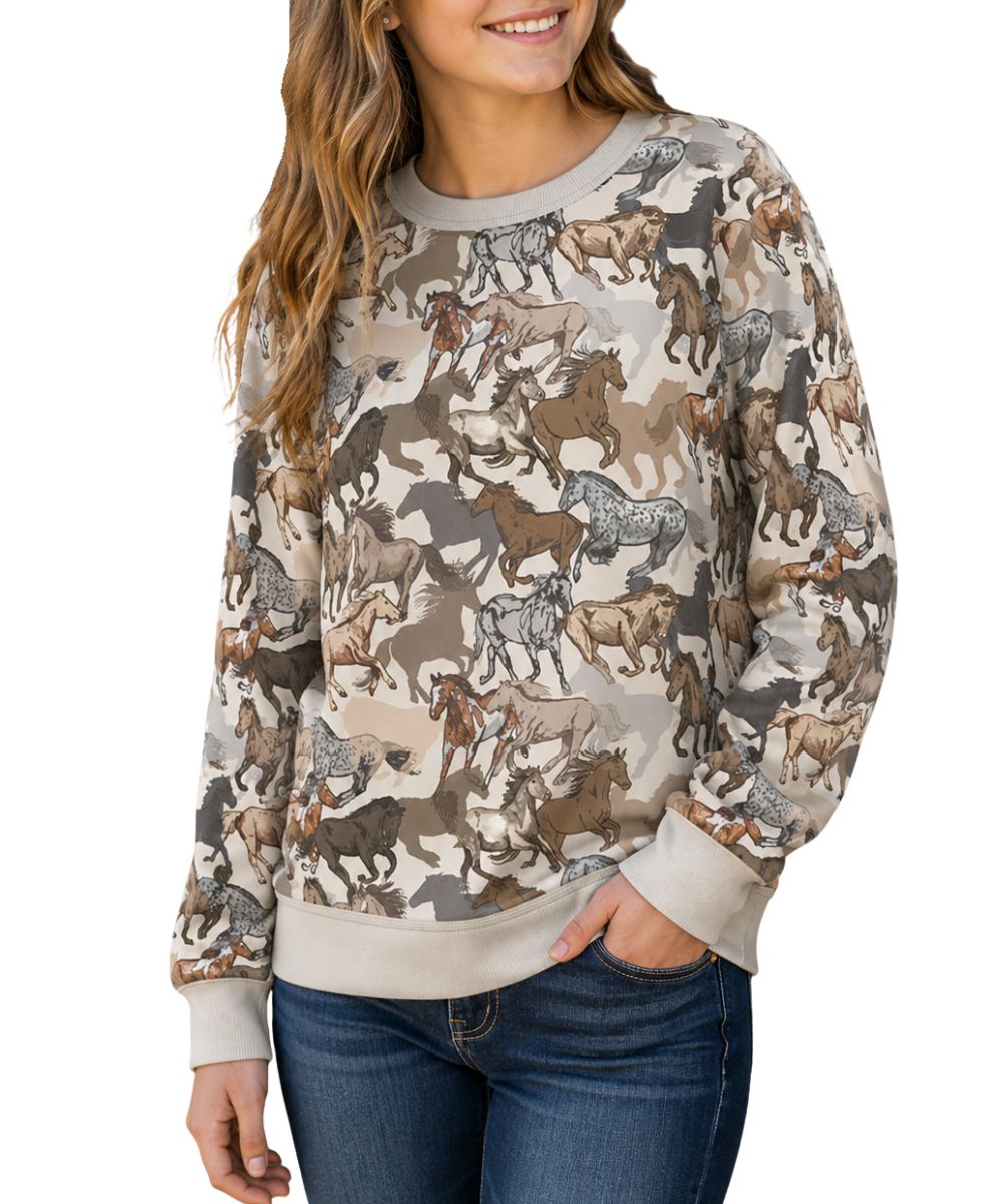Model view of the girl's white long sleeve crew neck pullover featuring the allover horse print design