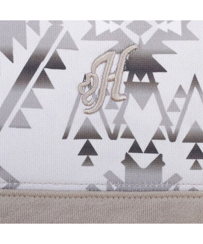 Close-up view of the logo embroidery at the left chest