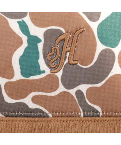Close-up view of the logo embroidery at the left chest