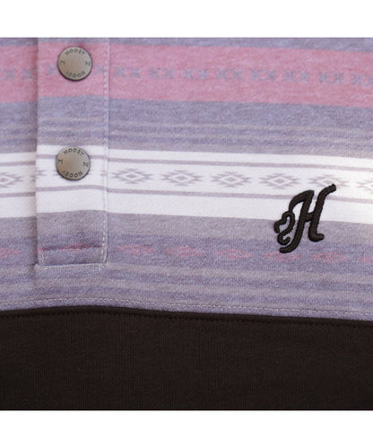 Close-up view of the logo custom snaps on the 5-snap placket and logo embroidery at the left chest