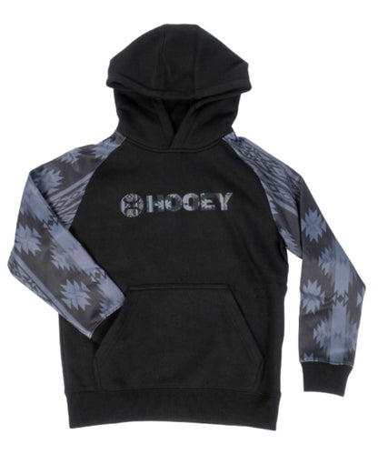 Front view of the boy's long sleeve hoodie featuring the charcoal aztec logo and sleeves, and the kangaroo pocket with a hidden phone pocket