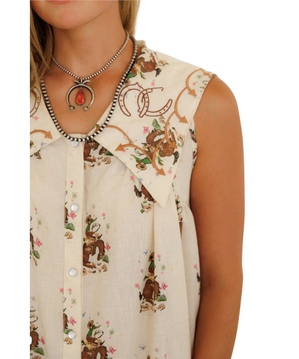 Close-up view of the women's sleeveless dress with a v-neckline, spread collar, and horseshoe embroidered collared shirt-style neckline