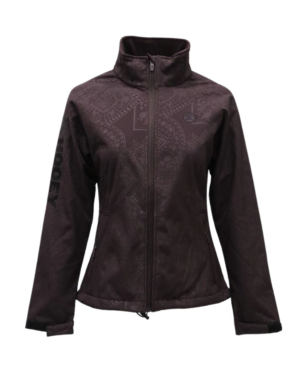 Front view of the women's brown Hooey softshell jacket featuring the zip closure, adjustable cuffs, zippered hand pockets, logo embroidery on the chest and sleeve, mock collar, and aztec print