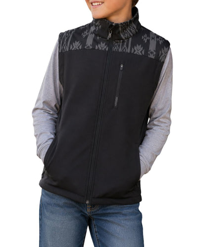 Model view of the boy's black softshell vest featuring the zipper closure and zippered pockets