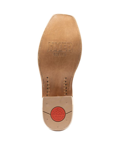 Sole view of the oiled leather outsole featuring the cutter underslung, leather stacked heel