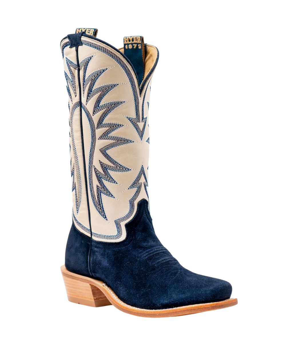 Right angled view of the women's Hyer Rose Hill Cowboy Boot featuring the 13" bone white cowhide leather shaft with a historic hyer stitched pattern, dark navy roughout leather vamp, navy leather piping, and woven pull straps