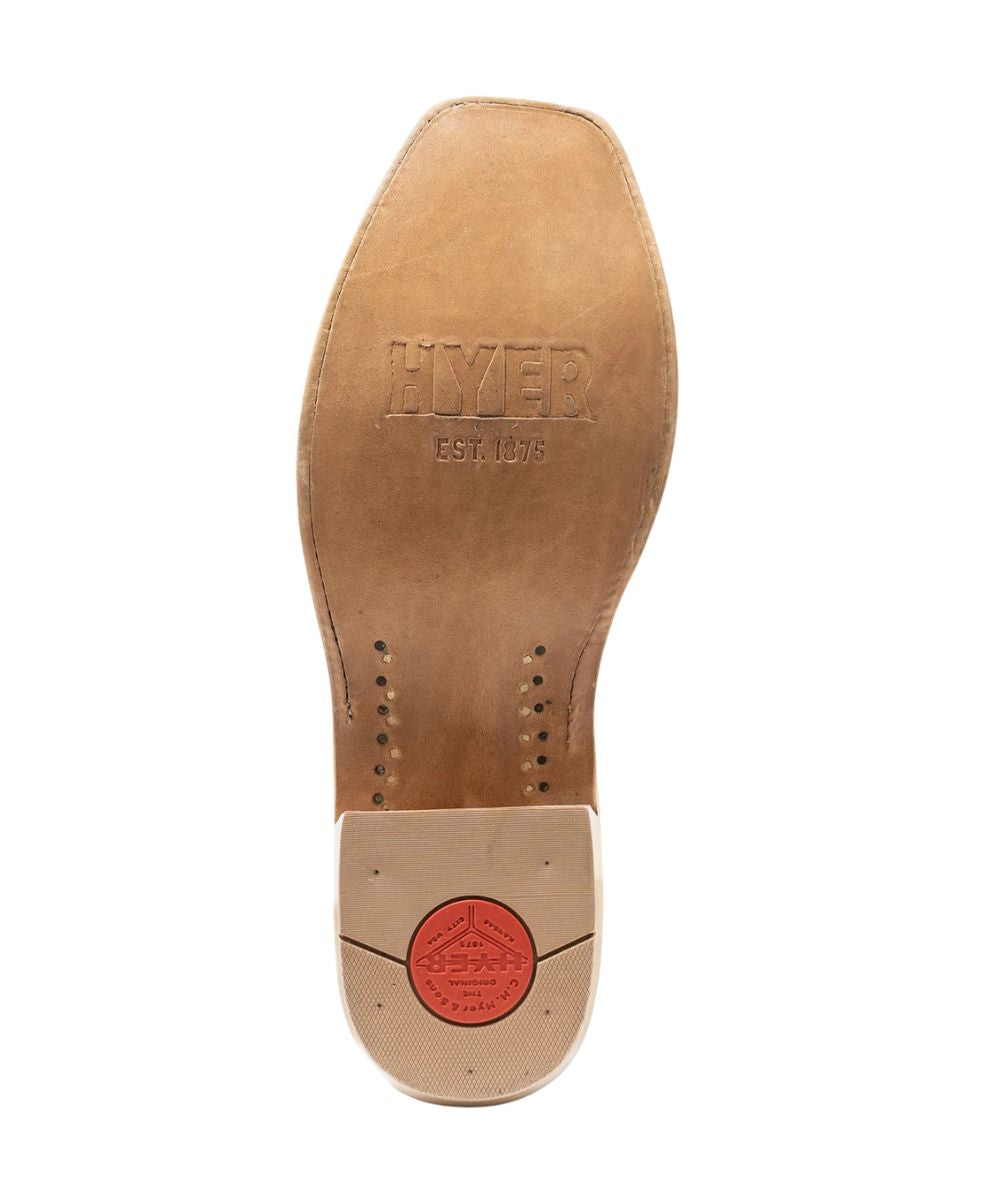 Sole view of the oiled leather outsole featuring the cutter underslung, leather stacked heel