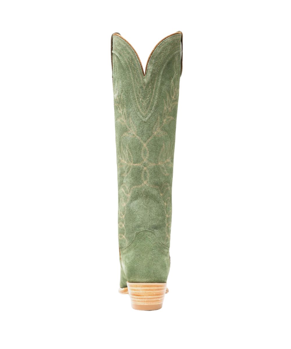A single sage green western boot shown from the back, featuring a textured leather shaft with light tan embroidered detailing and a stacked wood-look heel, set against a plain white background.