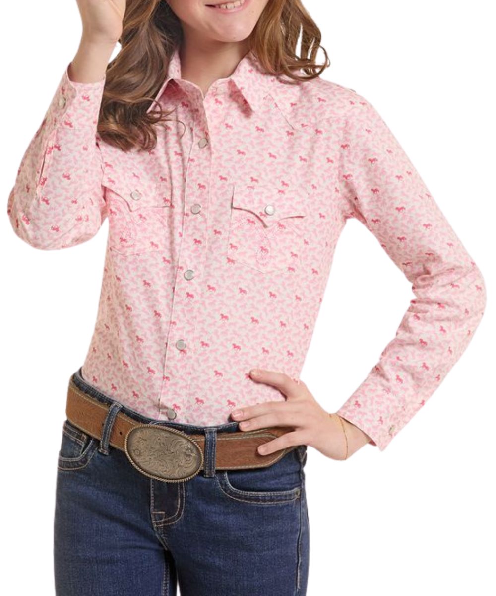 Front view of the girl's rose/mauve Panhandle Slim long sleeve snap shirt featuring the spread collar, snap flap chest pockets, western yokes, and the geometric mini horse print