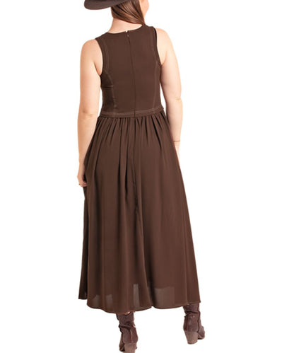A woman shown from the back wearing a sleeveless brown maxi dress with a gathered waist and a dark brown hat, against a plain white background.