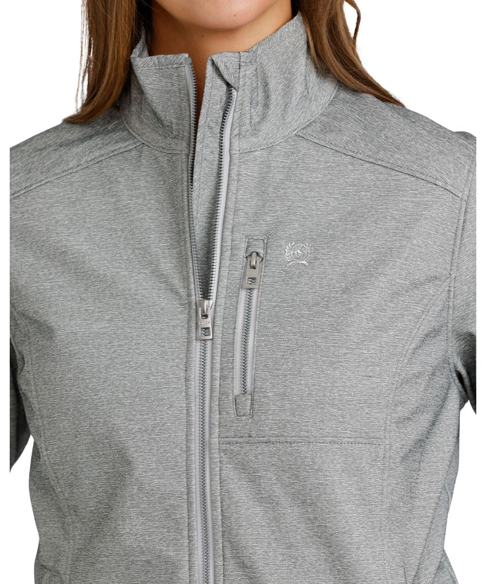 Close-up view of the zippered chest pocket featuring the metaluxe zippers and durable water-resistant finish