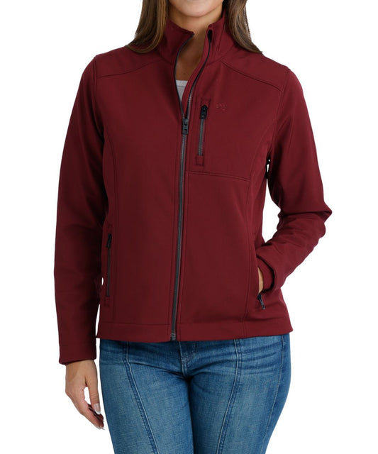 Front view of the women's burgundy Cinch bonded jacket featuring the zip closure, zippered hand and chest pockets, and the durable water-resistant finish