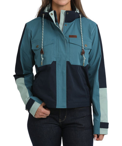 Front view of the women's teal color blocked Cinch Chore Jacket featuring the removable/adjustable hood, zip closure with snap storm flap, snap flap chest pockets, snap cuffs, and hand pockets