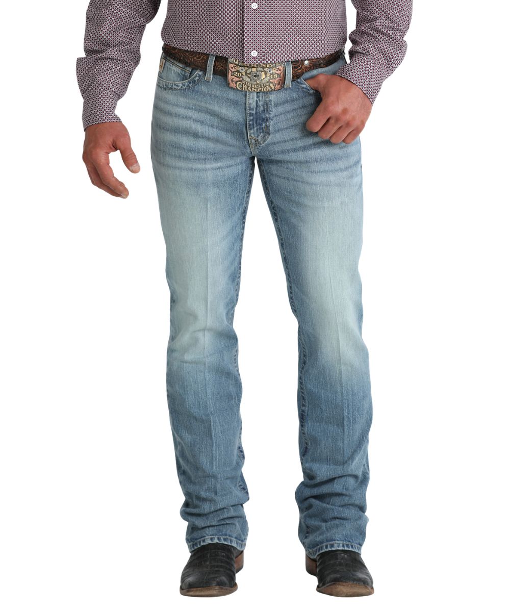 Front view of the men's mid-rise slim fit boot cut jean in a medium stonewash