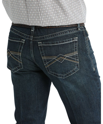 Close-up view of the cream and brown stitched back pockets