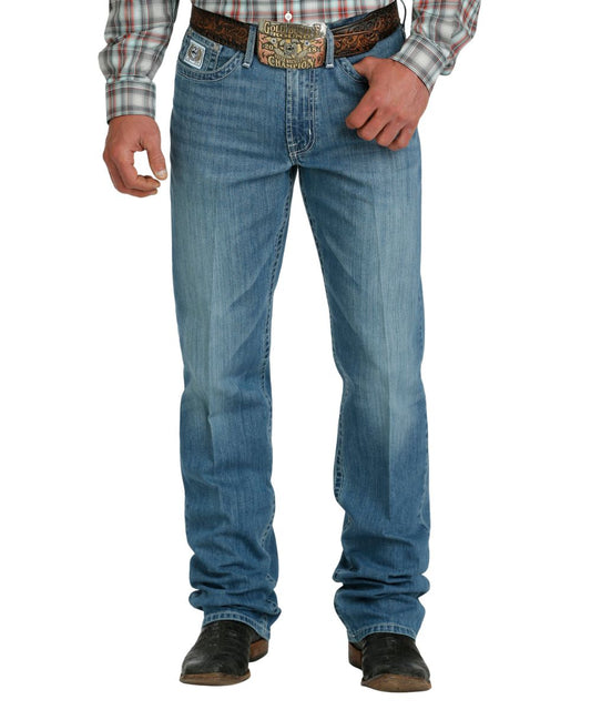 Front view of the men's medium stonewash white label jean featuring a mid rise and relaxed fit