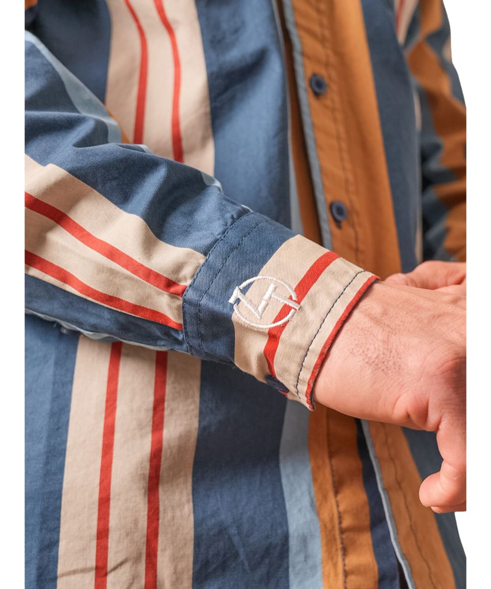 Close-up view of the striped print and Zach Top's signature intials embroidered at the right cuff 