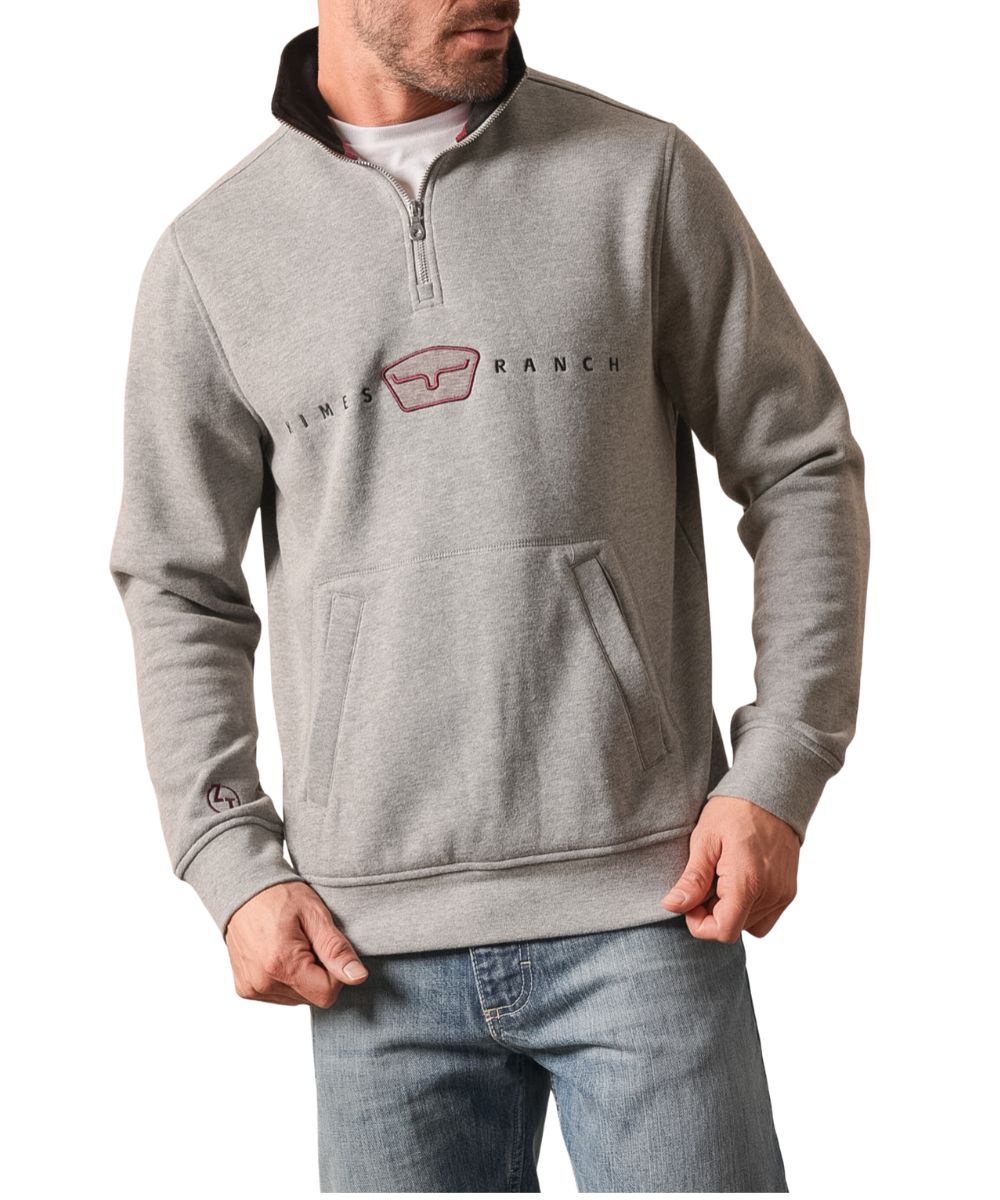 Front view of the men's dark grey heather Kimes Ranch Zach Top long sleeve pullover featuring the mock collar, logo embroidery and woodmark at the chest, kangaroo pocket, and Zach Top's signature logo embroidered at the right cuff