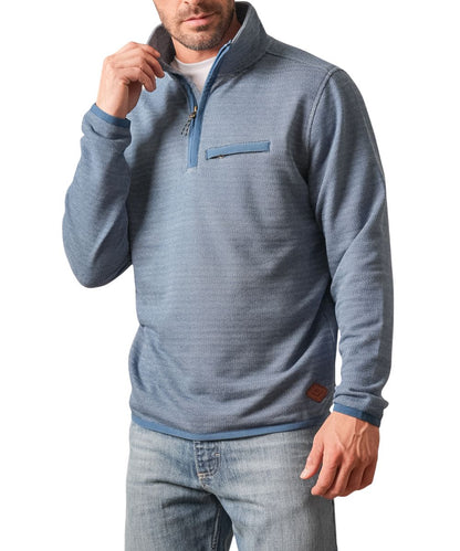 Front view of the men's blue Kimes Ranch long sleeve pullover featuring the houndstooth pattern, mock collar, 1/4 zip closure, zippered welt chest pocket, and a leather logo patch at the hem