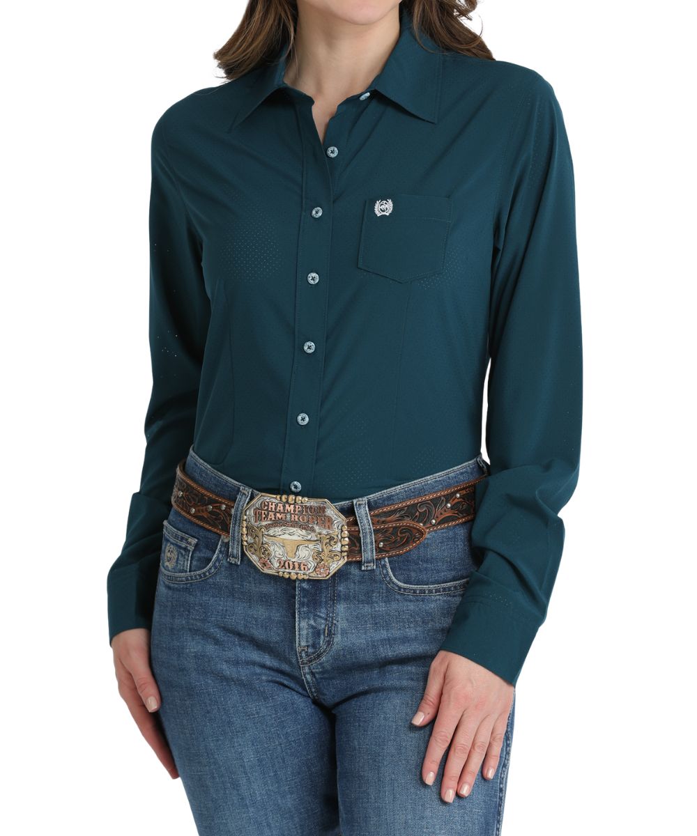 Front view of the women's teal perforated long sleeve button down shirt
