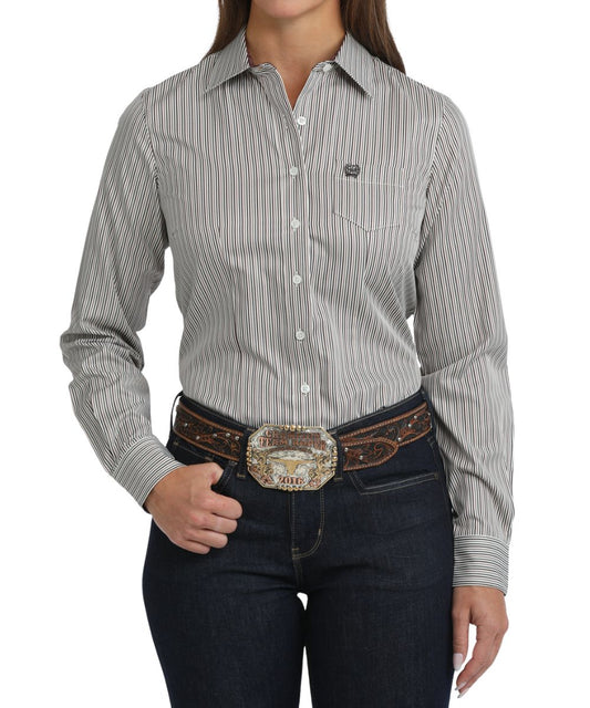 Front view of the women's white Cinch long sleeve button down shirt featuring the spread collar, chest pocket, white buttons, and vertical striped print