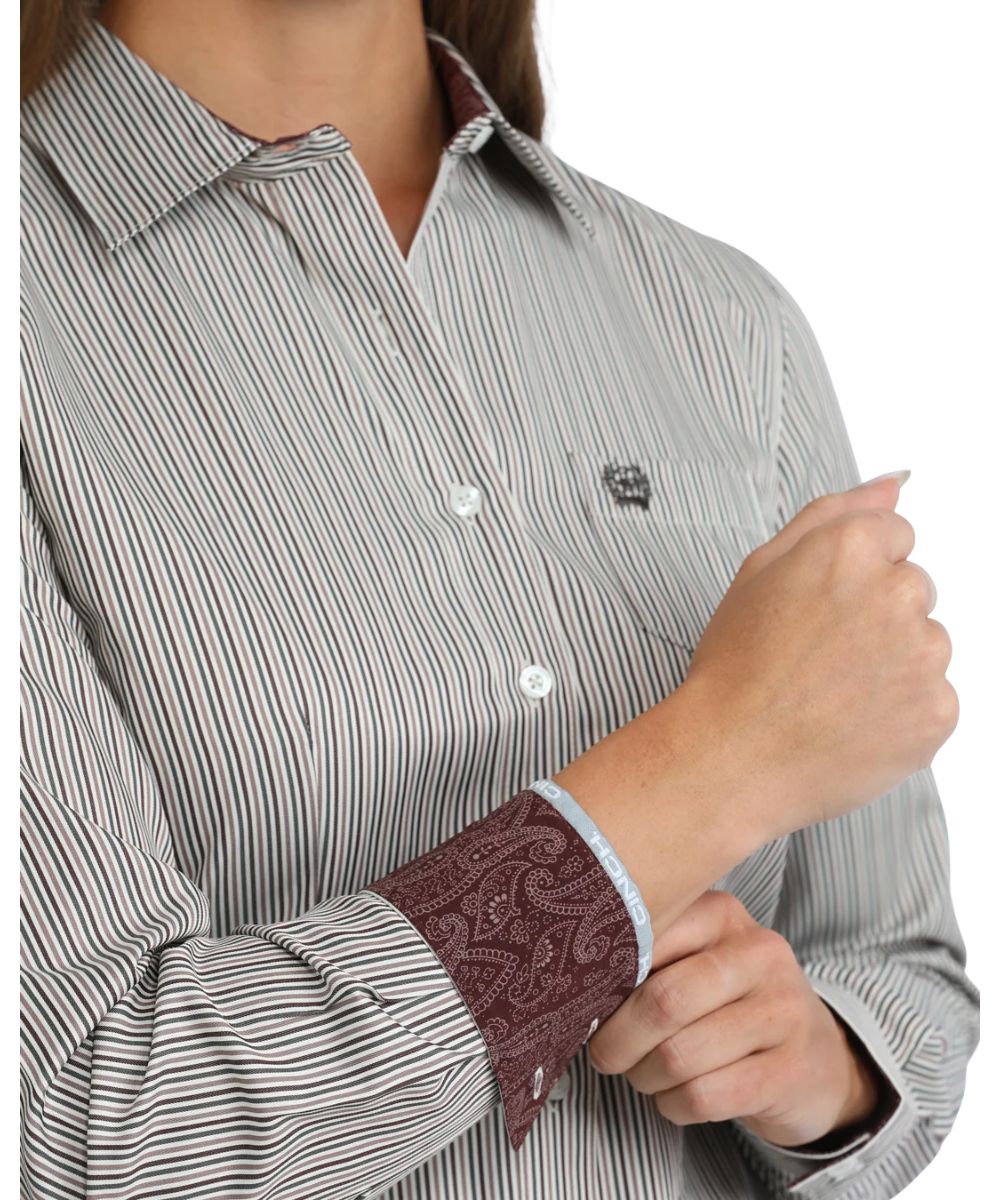 Close-up view of the vertical striped print and contrast interior trim