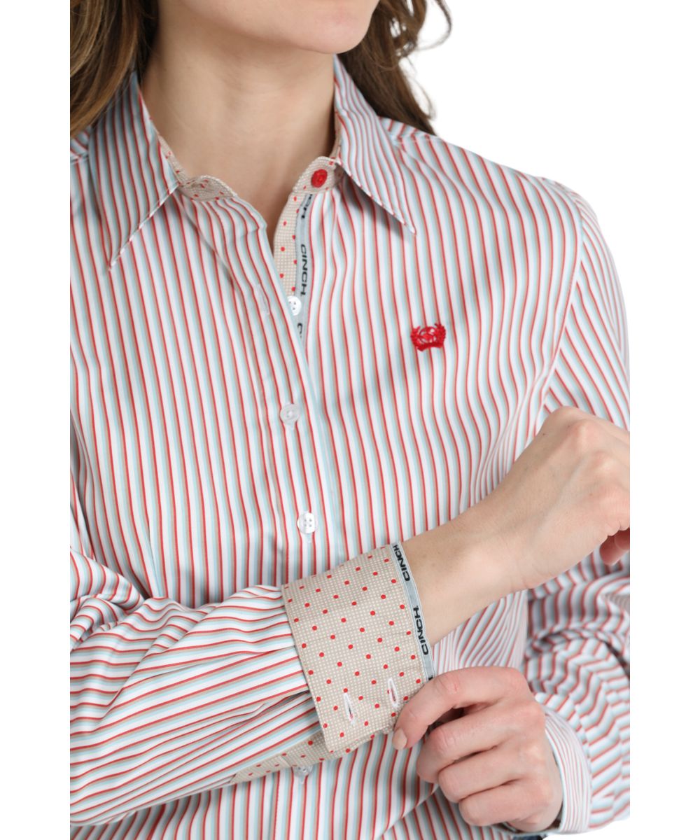 Close-up view of the red striped print and contrast interior trim