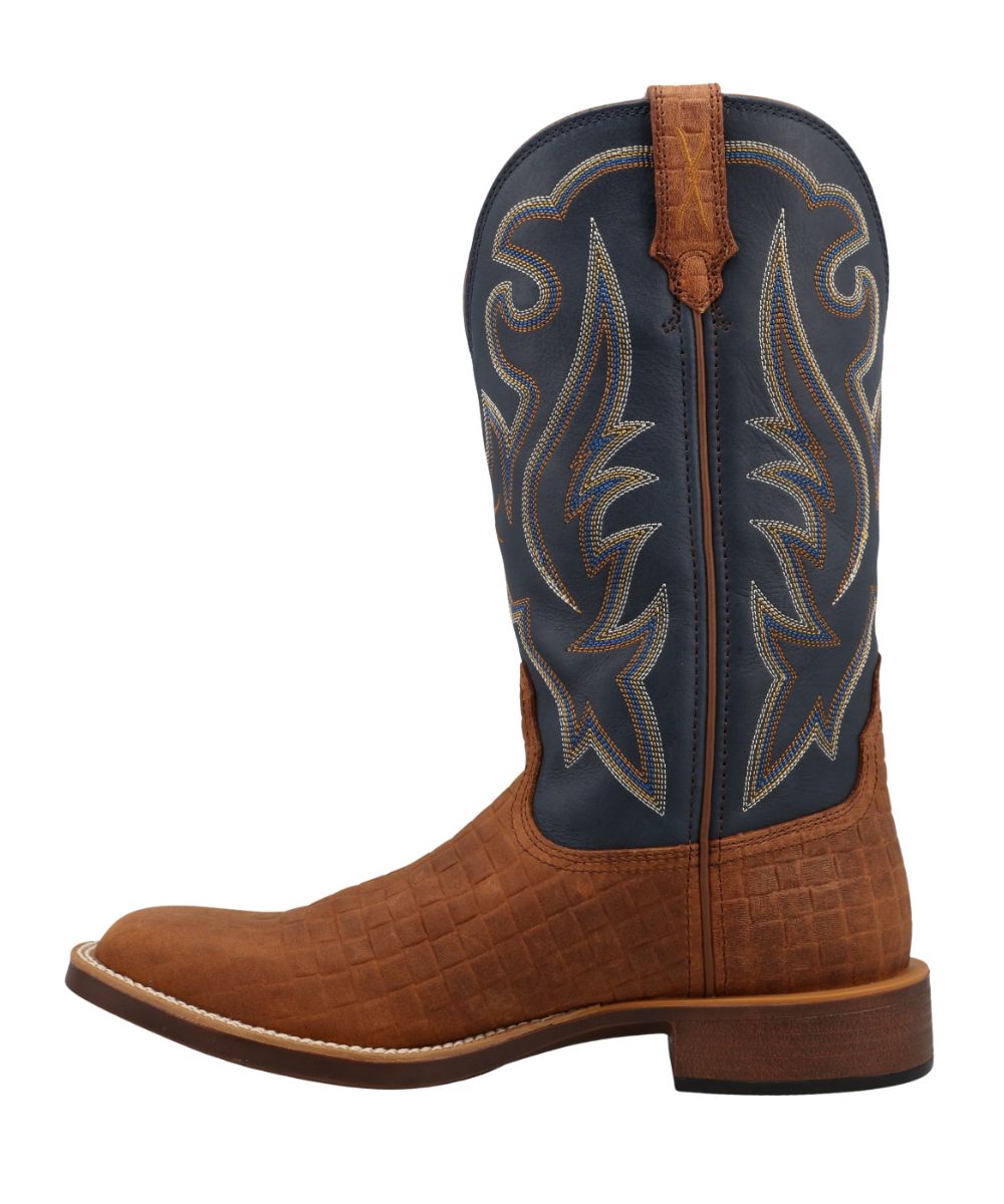 Left side view of the men's 13" top hand boot featuring a chestnut brown embossed leather vamp and a navy blue leather shaft with contrast stitching