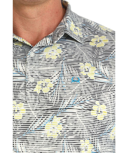 Close-Up View Of The Sublimated Hawaiian Print Featuring The Spread Collar And 3-Button Polo Placket