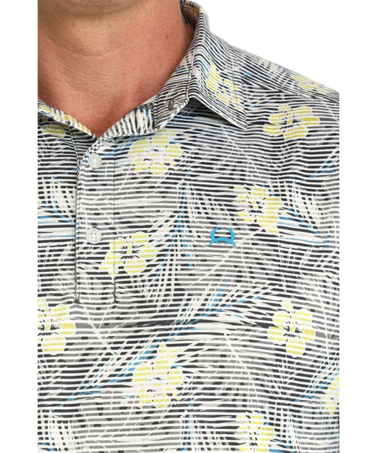 Close-Up View Of The Sublimated Hawaiian Print Featuring The Spread Collar And 3-Button Polo Placket
