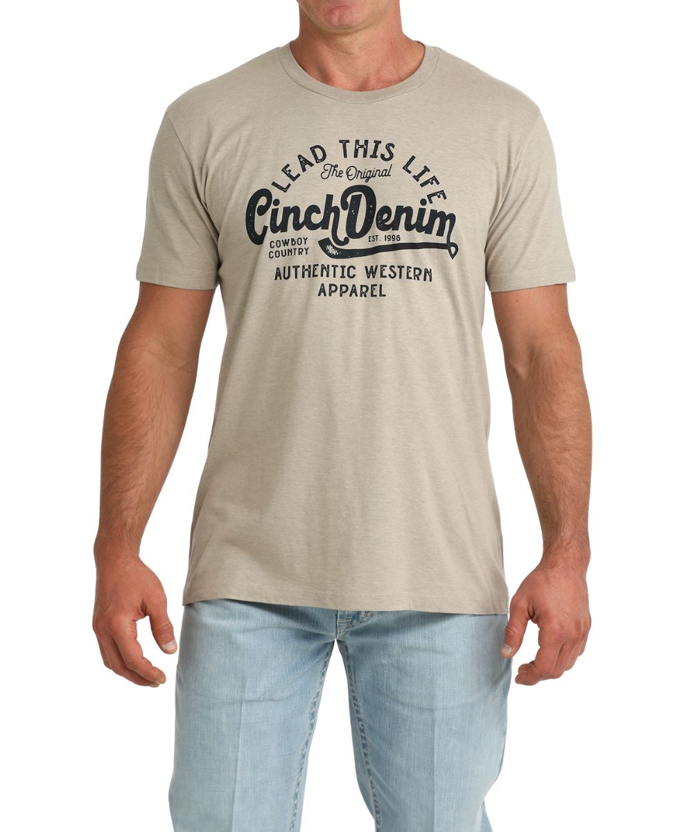 Men's Khaki Graphic Tee Reads: "The Original Cinch Denim Est. 1996 - Lead This Life - Authentic Western Apparel - Cowboy Country" On The Front