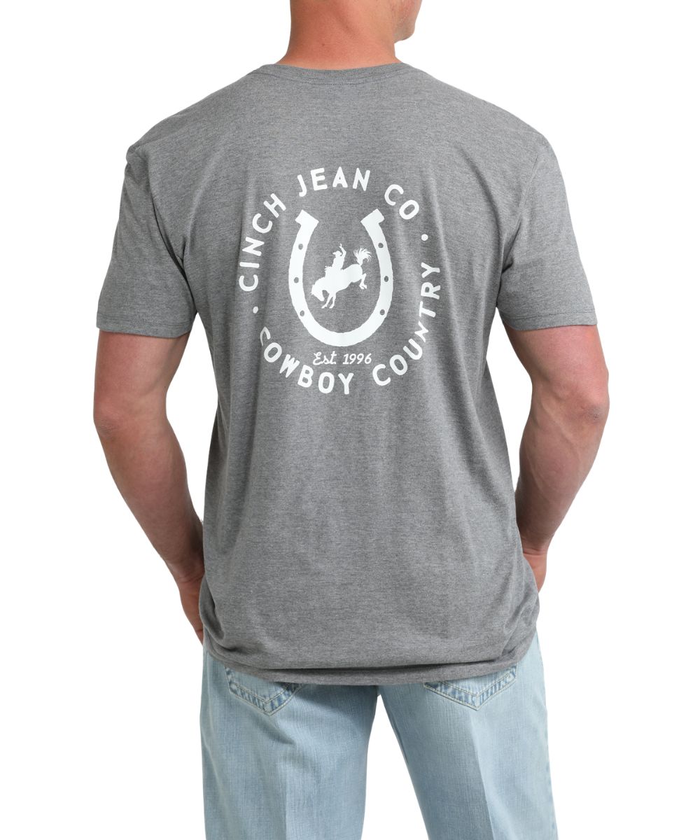 Back view of the men's gray graphic tee featuring a cowboy graphic and screen print that reads: "Cowboy Country"