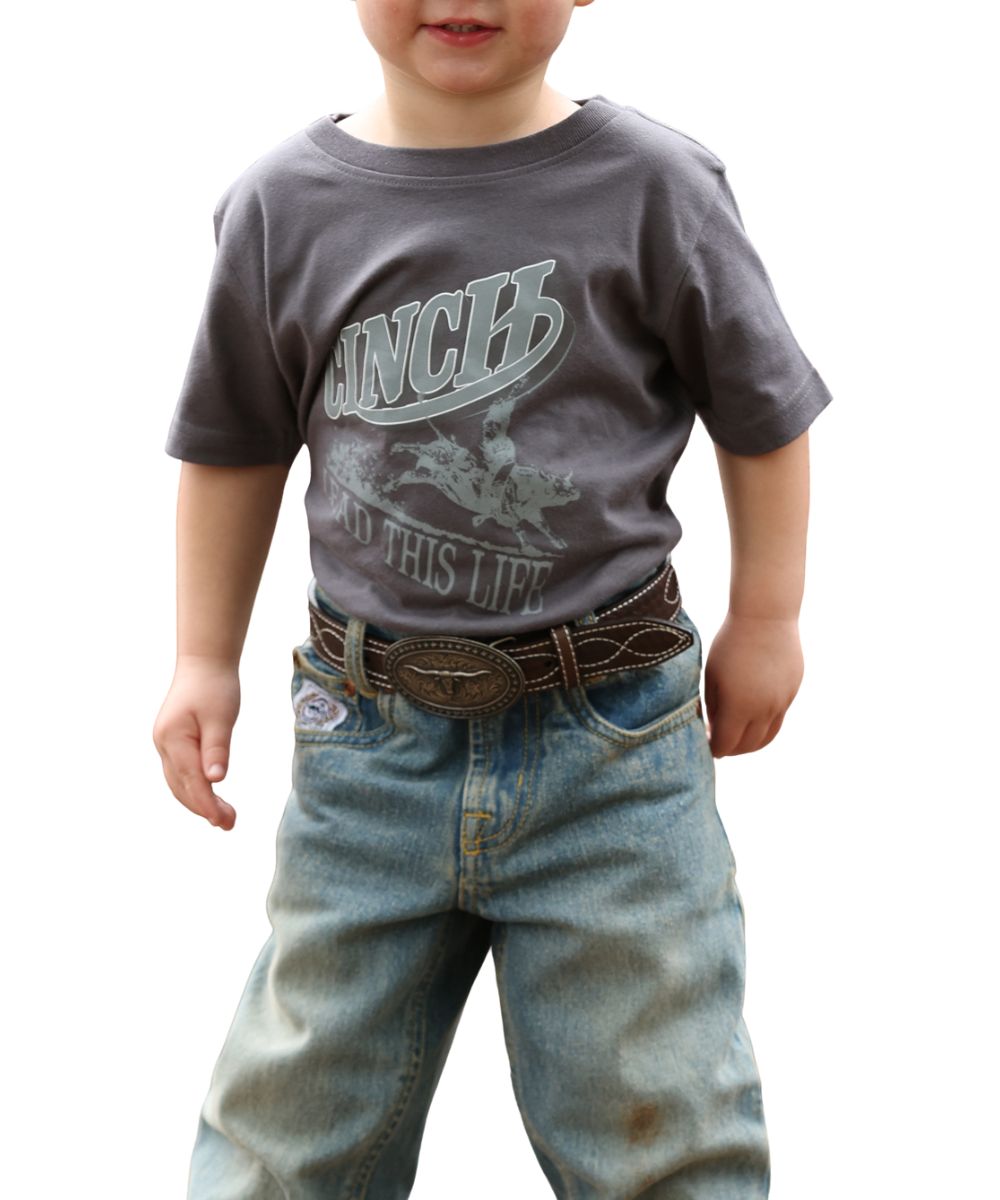 Front view of the infant boy's charcoal tee with a screen print that reads: "Cinch Lead This Life" with a bucking bull graphic