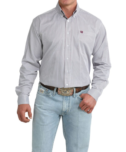 Front view of the men's white long sleeve button down shirt featuring a striped print, chest pocket, and a button down collar