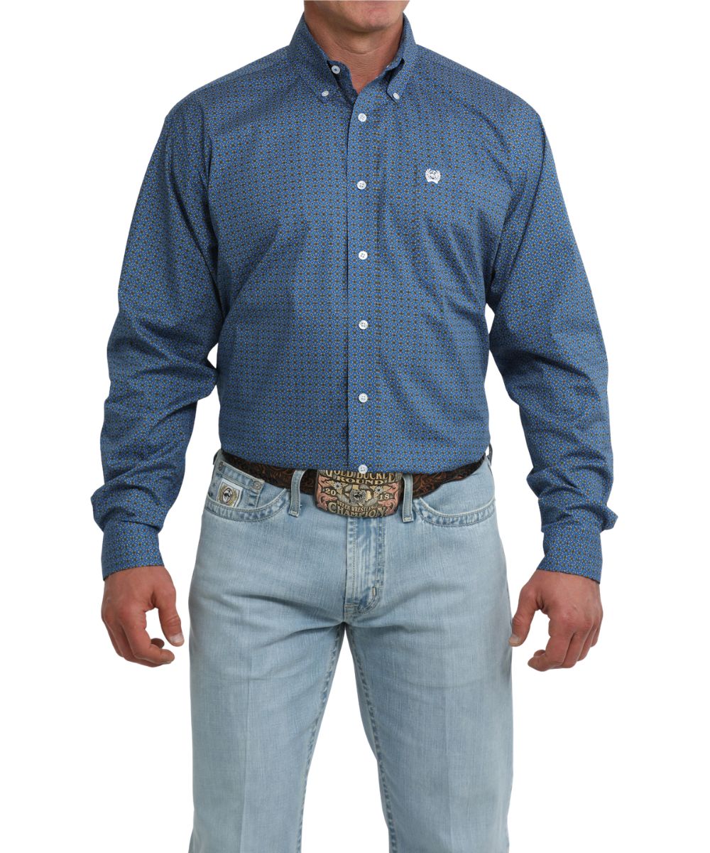 Front view of the men's royal blue long sleeve button down shirt featuring a geometric print