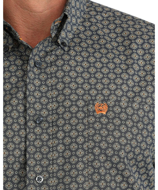 Close-up view of the geometric print and single open chest pocket