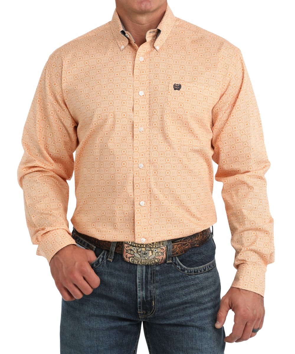 Front view of the men's gold Cinch long sleeve button down shirt featuring the classic fit, white geometric print, white buttons, and chest pocket