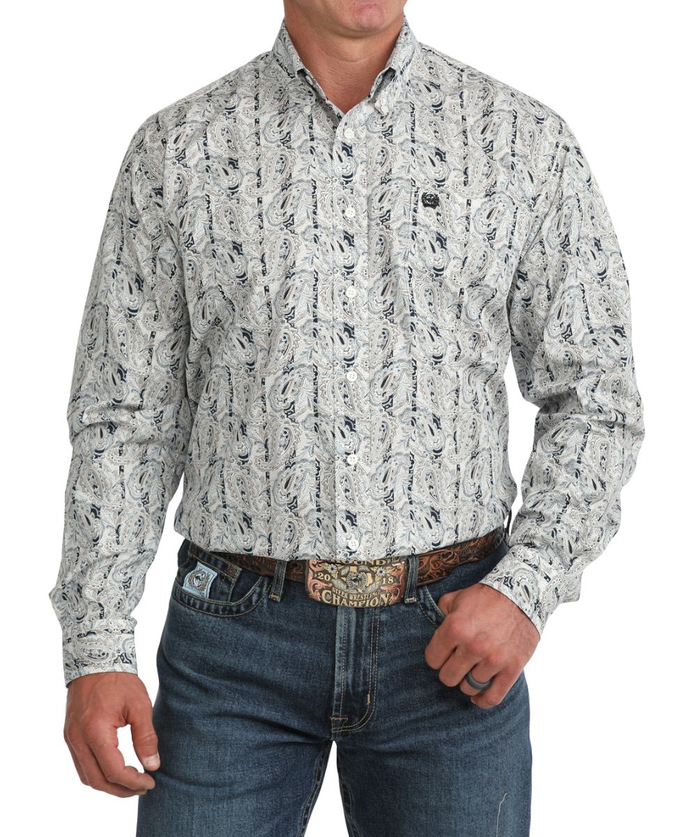 Front view of the men's cream Cinch long sleeve button down shirt featuring the classic fit, button down collar, chest pocket, and the navy striped print with a paisley overlay print