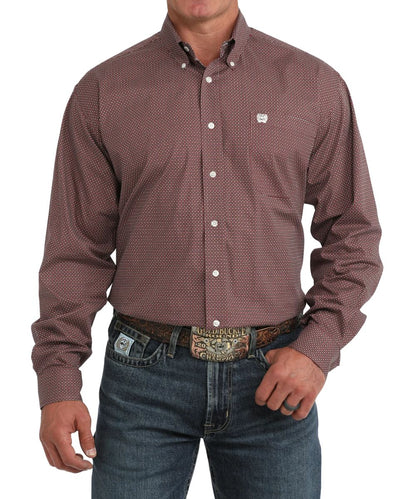 Front view of the men's pink Cinch long sleeve button down shirt featuring the button down collar, white buttons, chest pocket, classic fit, and geometric print