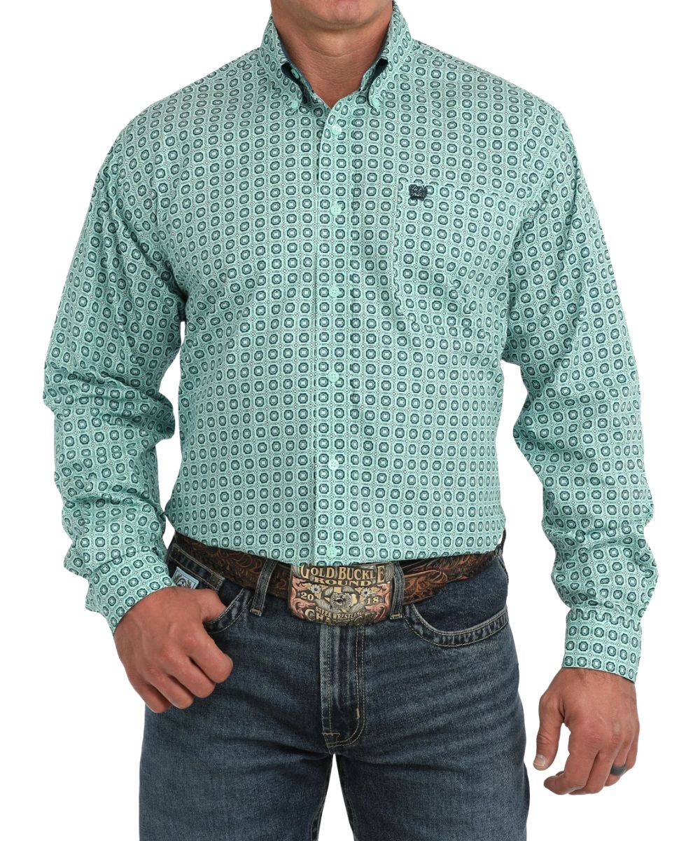 Front view of the men's turquoise Cinch long sleeve button down shirt featuring the button-down collar, turquoise buttons, single open chest pocket, classic fit, and geometric print