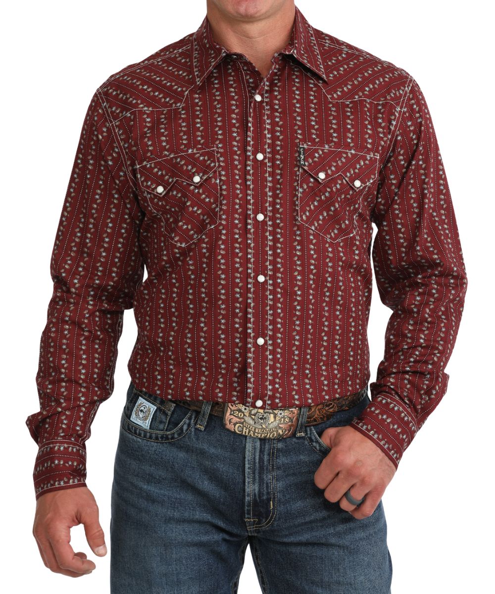 Front view of the men's burgundy Cinch long sleeve snap shirt featuring the modern fit, floral wallpaper striped print, sawtooth snap flap chest pockets, and western yokes