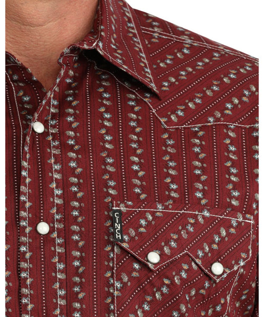 Close-up view of the floral striped print featuring the white marble snaps, spread collar, contrast topstitch, and sawtooth snap flap chest pockets
