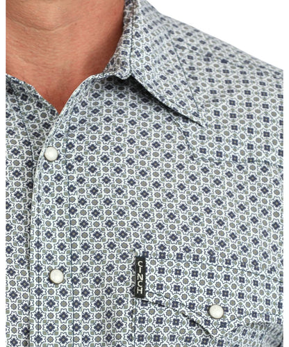Close-up view of the blue & grey geometric print, white marble snaps, and spread collar