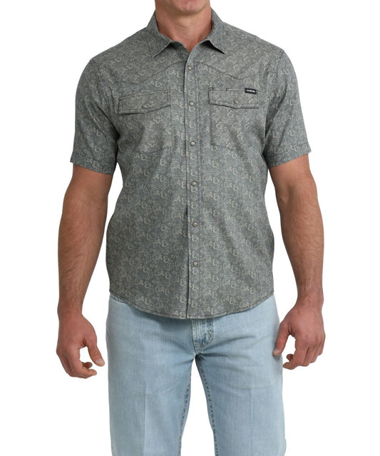Front view of the men's short sleeve snap shirt featuring the navy geometric print, marble snaps, and chest pockets