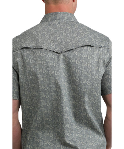 Back view of the men's navy snap shirt featuring a vented back yoke