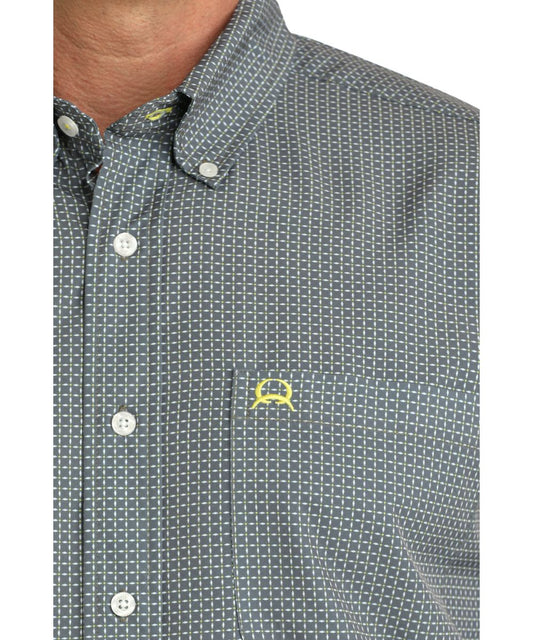 Close-Up View Of The Geometric Print, Chest Pocket, And Button Down Collar