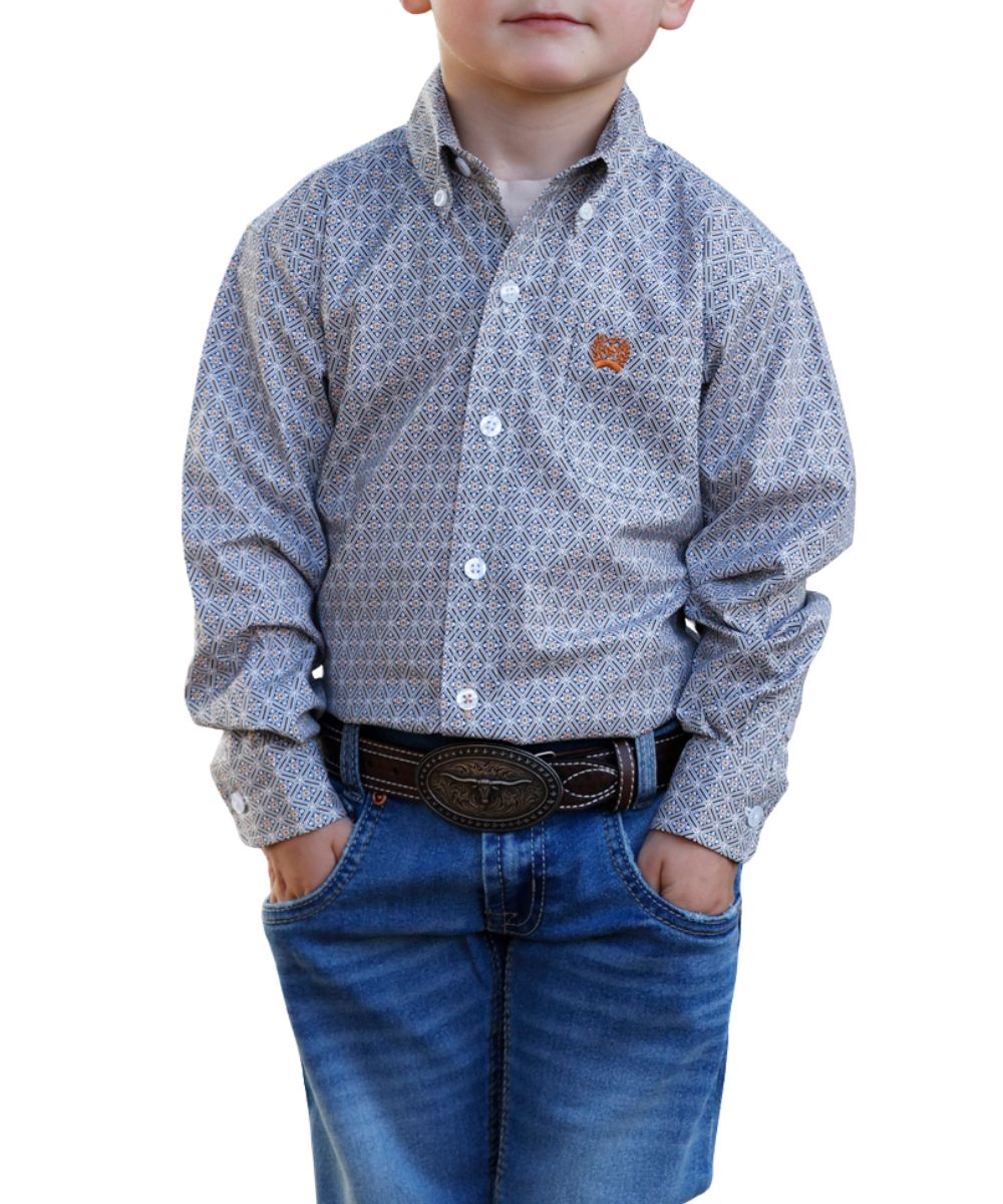 Front view of the toddler boy's white Cinch long sleeve button down shirt featuring the white buttons, button down collar, single open chest pocket, and geometric print