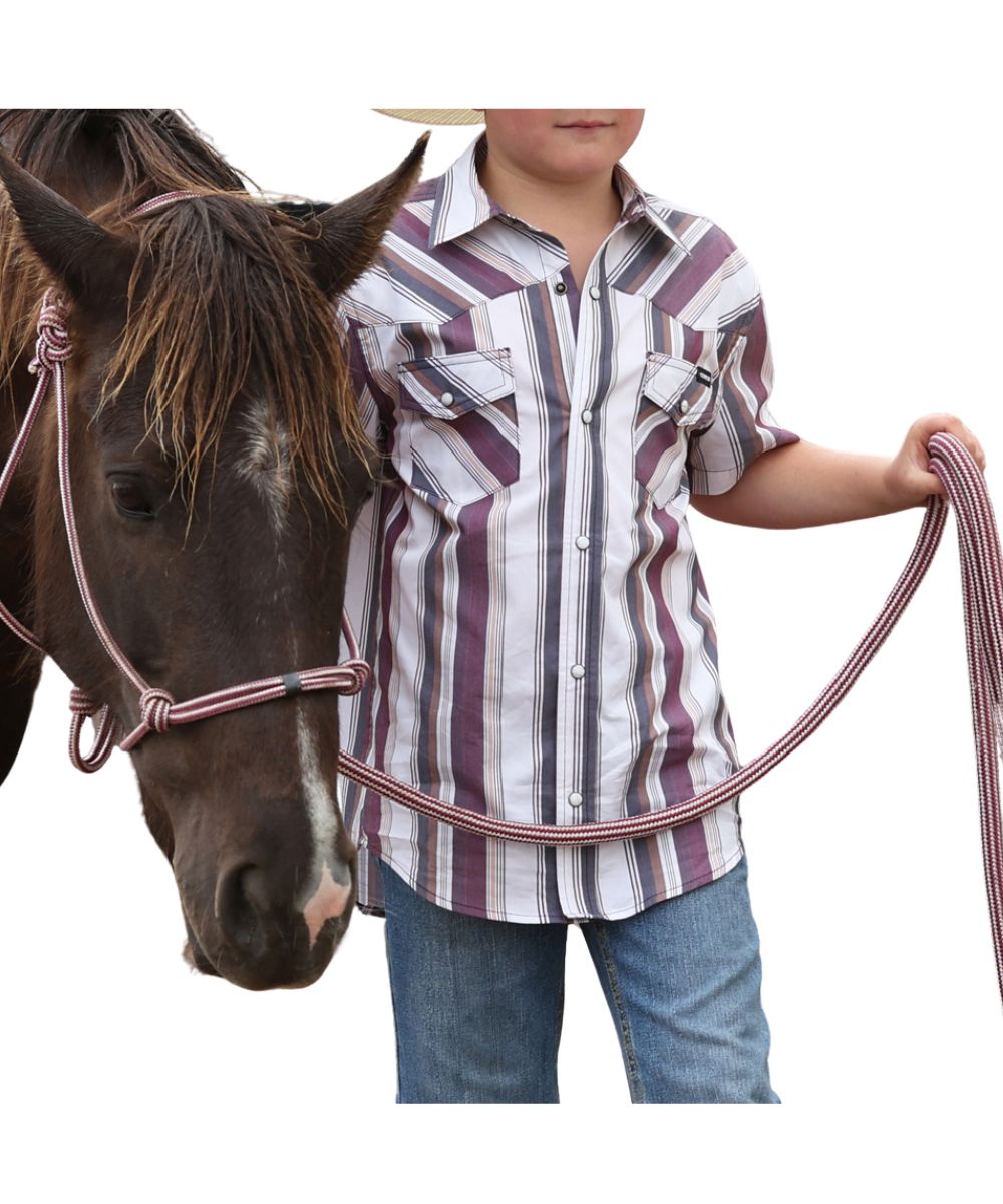 Front view of the boy's short sleeve button down camp shirt in a white retro striped print
