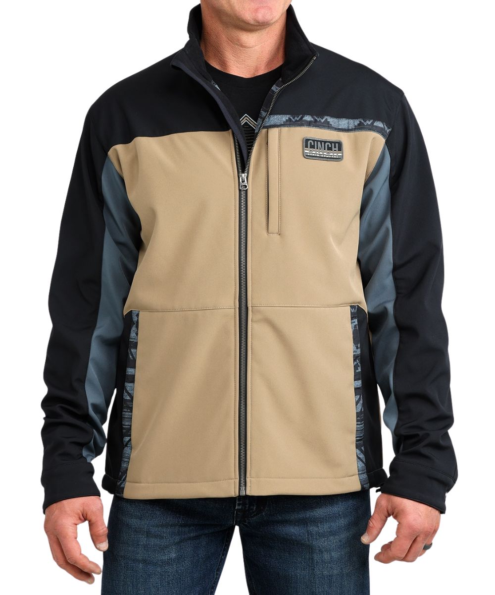 Front view of the men's color blocked Cinch Bonded Jacket featuring the mock collar, zip closure, snap cuffs, and zippered hand & chest pockets